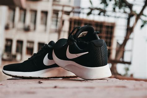 white and black nike shoes